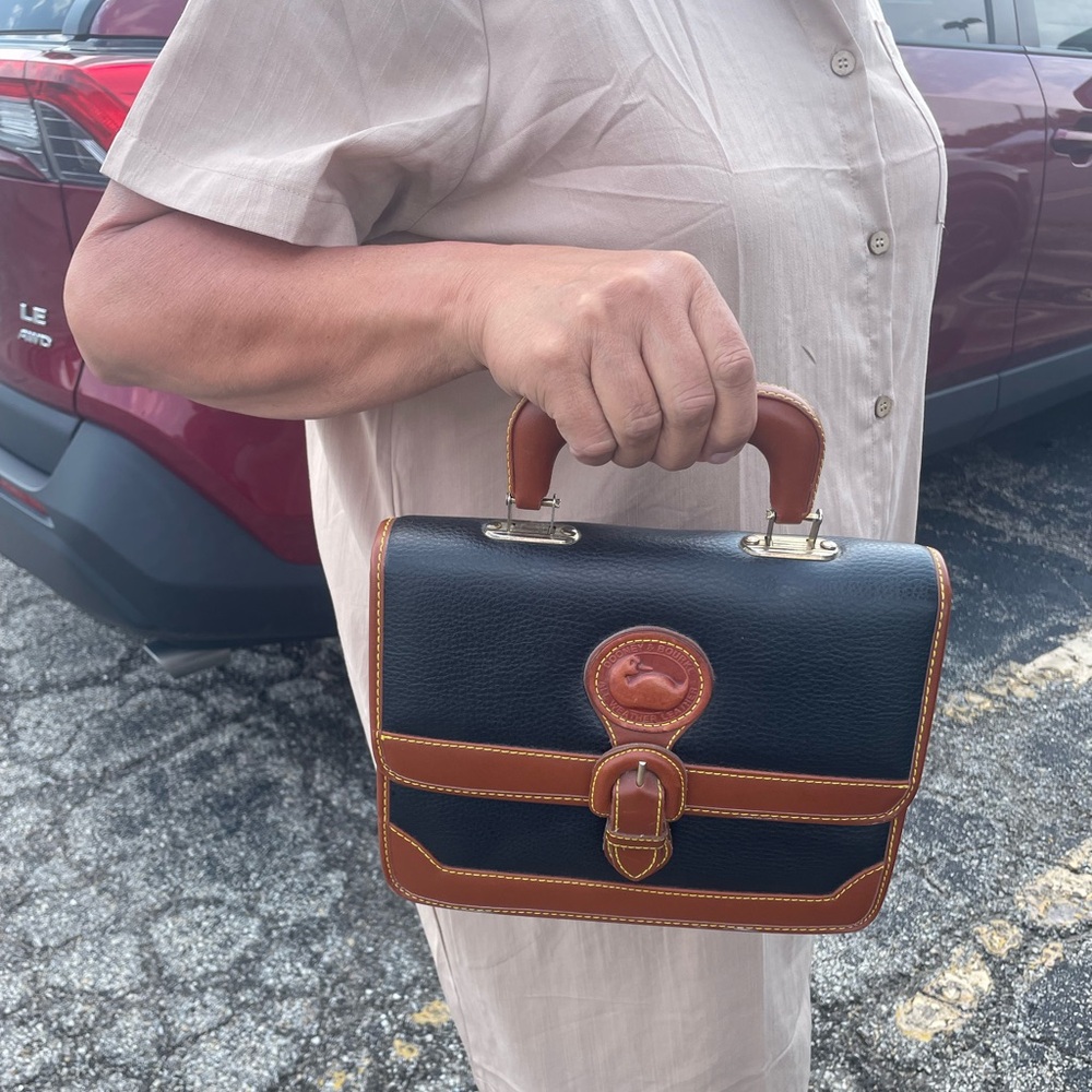 Dooney and Bourke Black and Brown Leather top handle bag